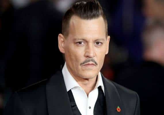 "מצטער שהתאהב בה": ג'וני דפ נואש לתקן את התדמית ההרוסה שלו