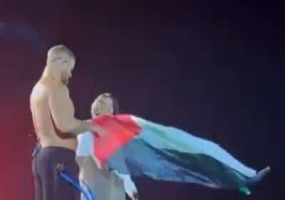 סולן Imagine Dragons סיים הופעה במילאנו עם דגל פלסטין: צפו
