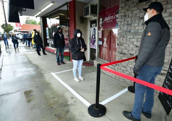 חוקרים בהארוורד מזהירים: יתכן שנצטרך לשמור על ריחוק חברתי עד 2022