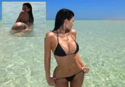 קיילי ג'נר מוציאה את העיניים בתמונות מחופשת בטן-גב