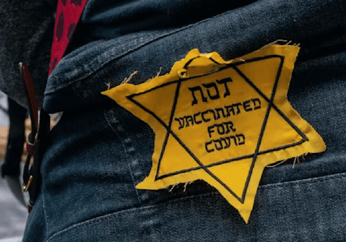 ניו יורק: צלב קרס וטלאי צהוב בהפגנה נגד חיסונים מול משרדו של מחוקק יהודי