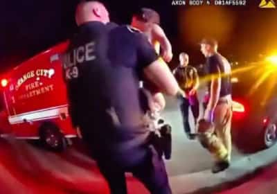 שניות מורטות עצבים תועדו במצלמת גוף: שוטר ממחוז אורנג' הציל תינוקת שנחנקה מסיכה לשיער