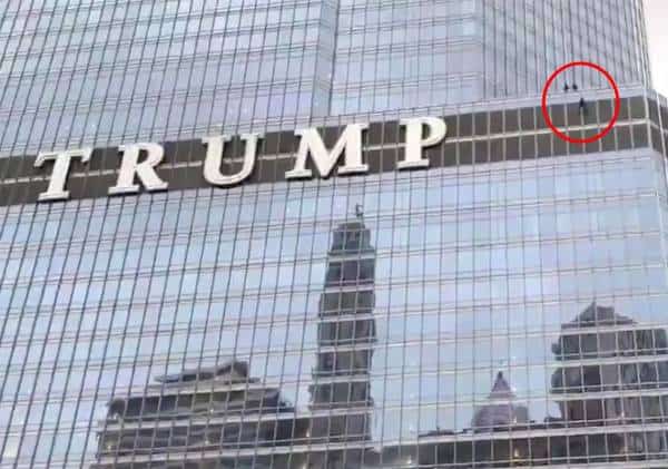 צעיר נתלה מחוץ ל'מגדל טראמפ' ודרש: "תנו לי לדבר עם הנשיא"