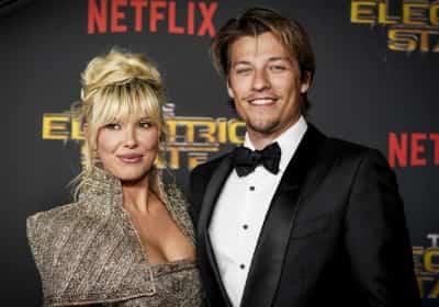 בגיל 21: מילי בובי בראון ובעלה ג'ייק בון ג'ובי אימצו תינוקת